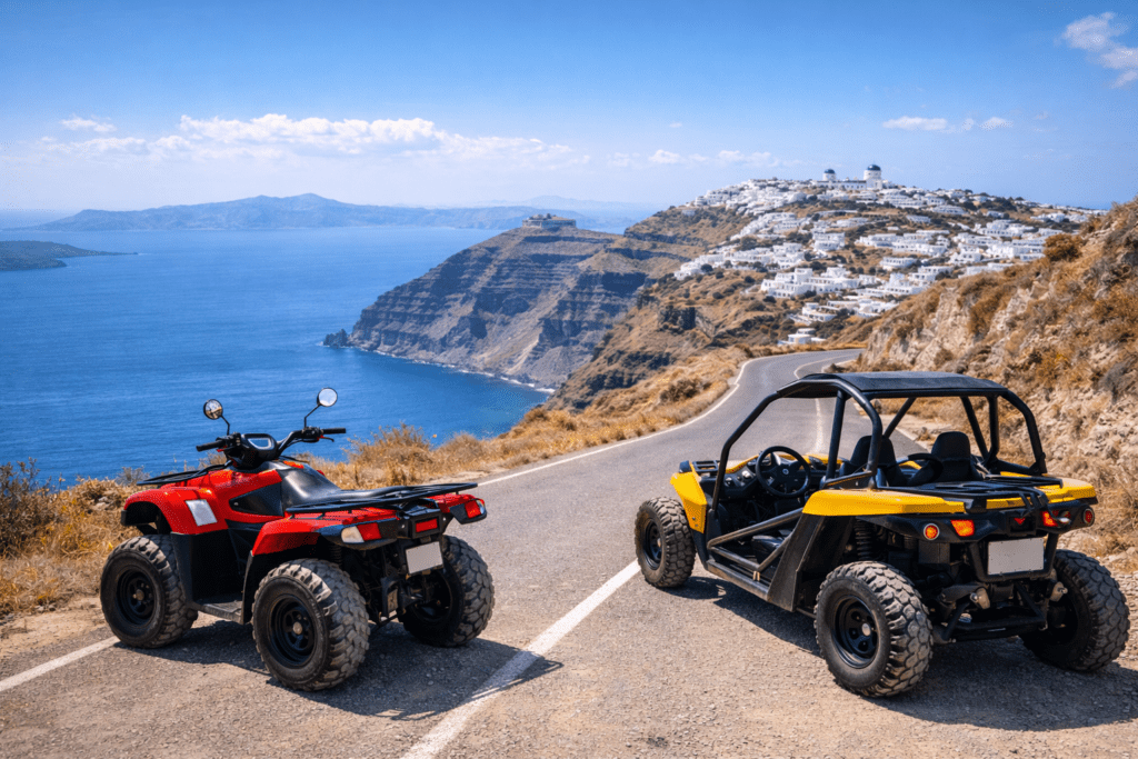 A red ATV and a yellow buggy parked on a scenic coastal road in Santorini, overlooking the caldera, white Cycladic buildings, and the deep blue Aegean Sea.